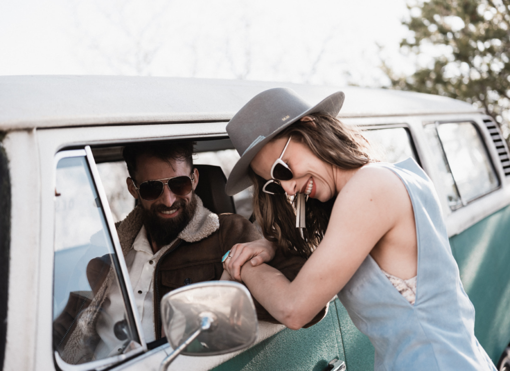 couple laughing in vw van