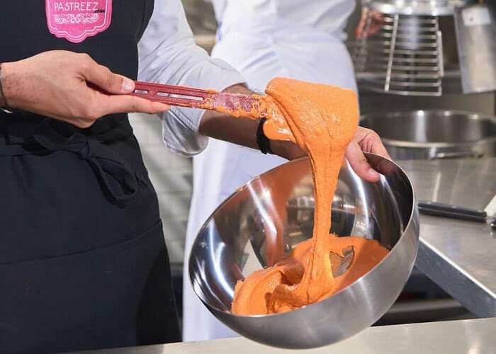 anthony mixing dough pastreez macarons merchant stories